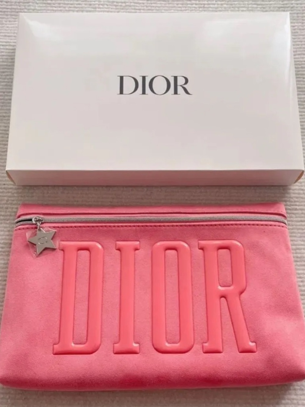 New authentic Dior Pink Suede Embossed Logo Zip Pouch with Star Charm